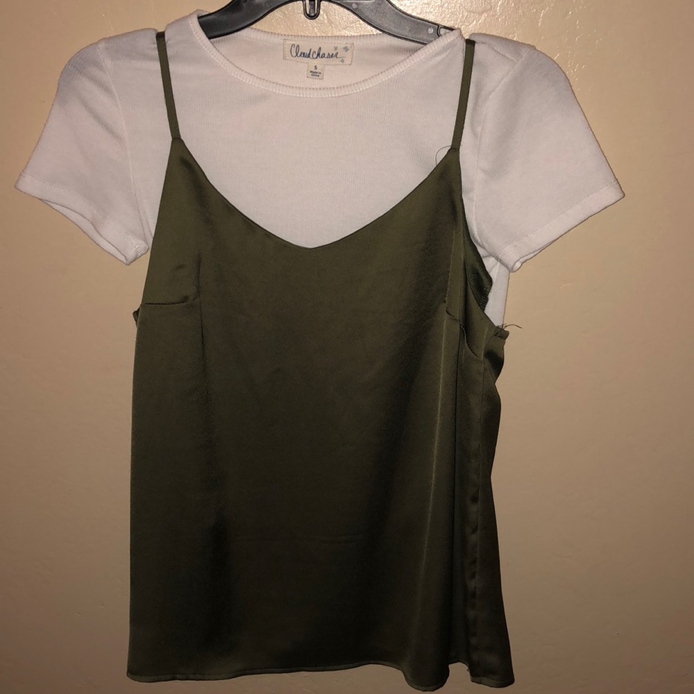 Tank top attached to silky top. Never worn!